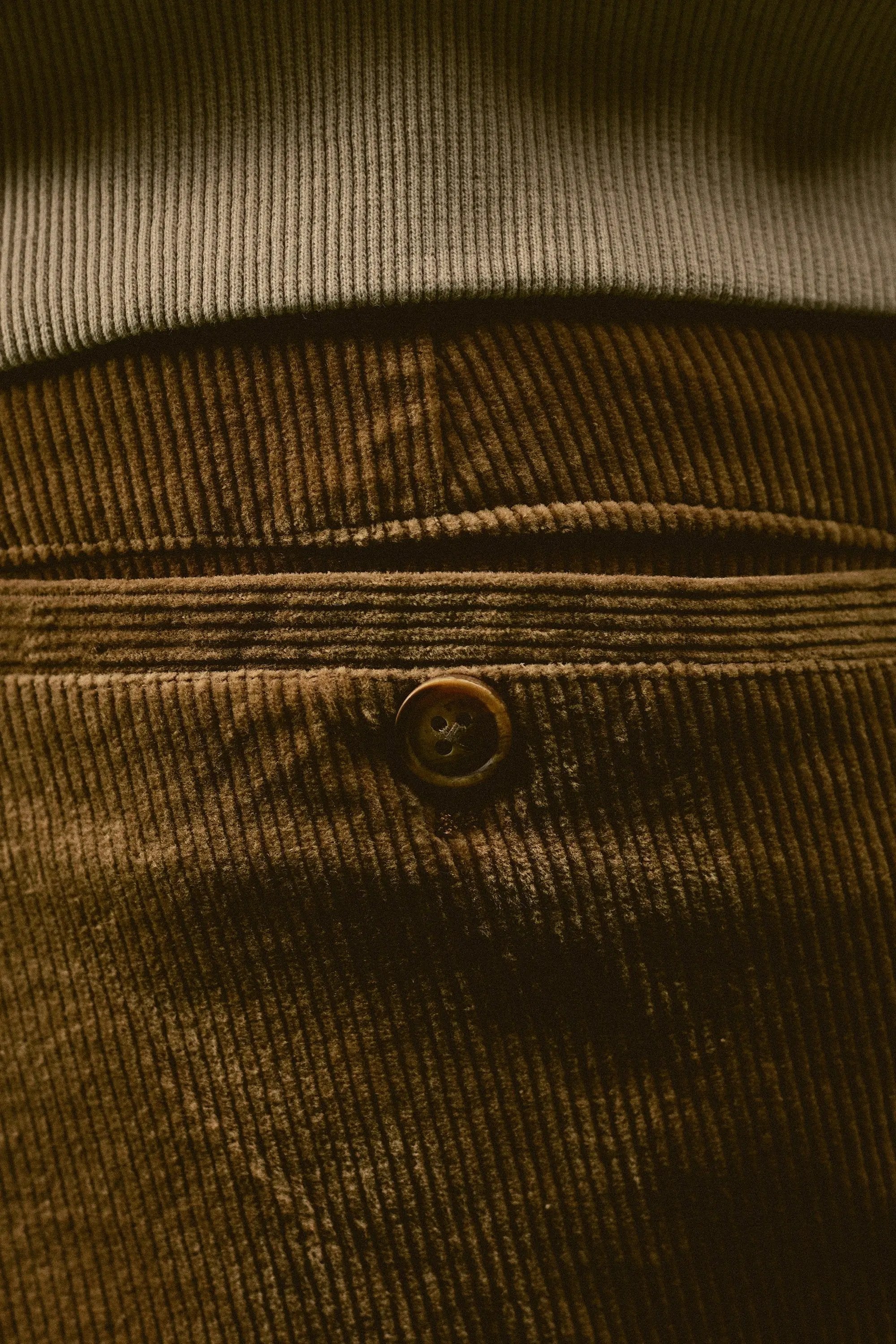 a close up of a person's brown pants