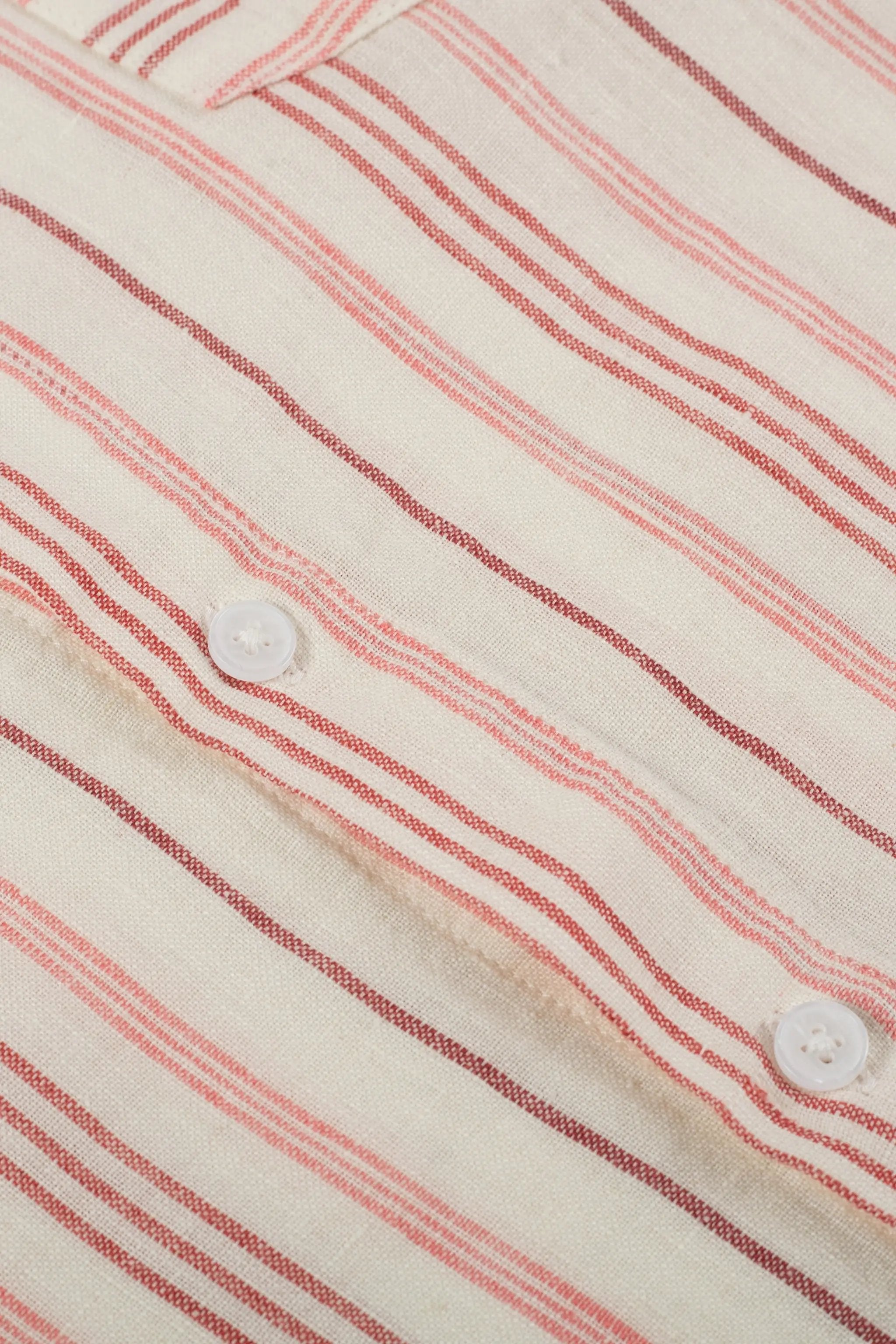 a close up of a red and white striped shirt