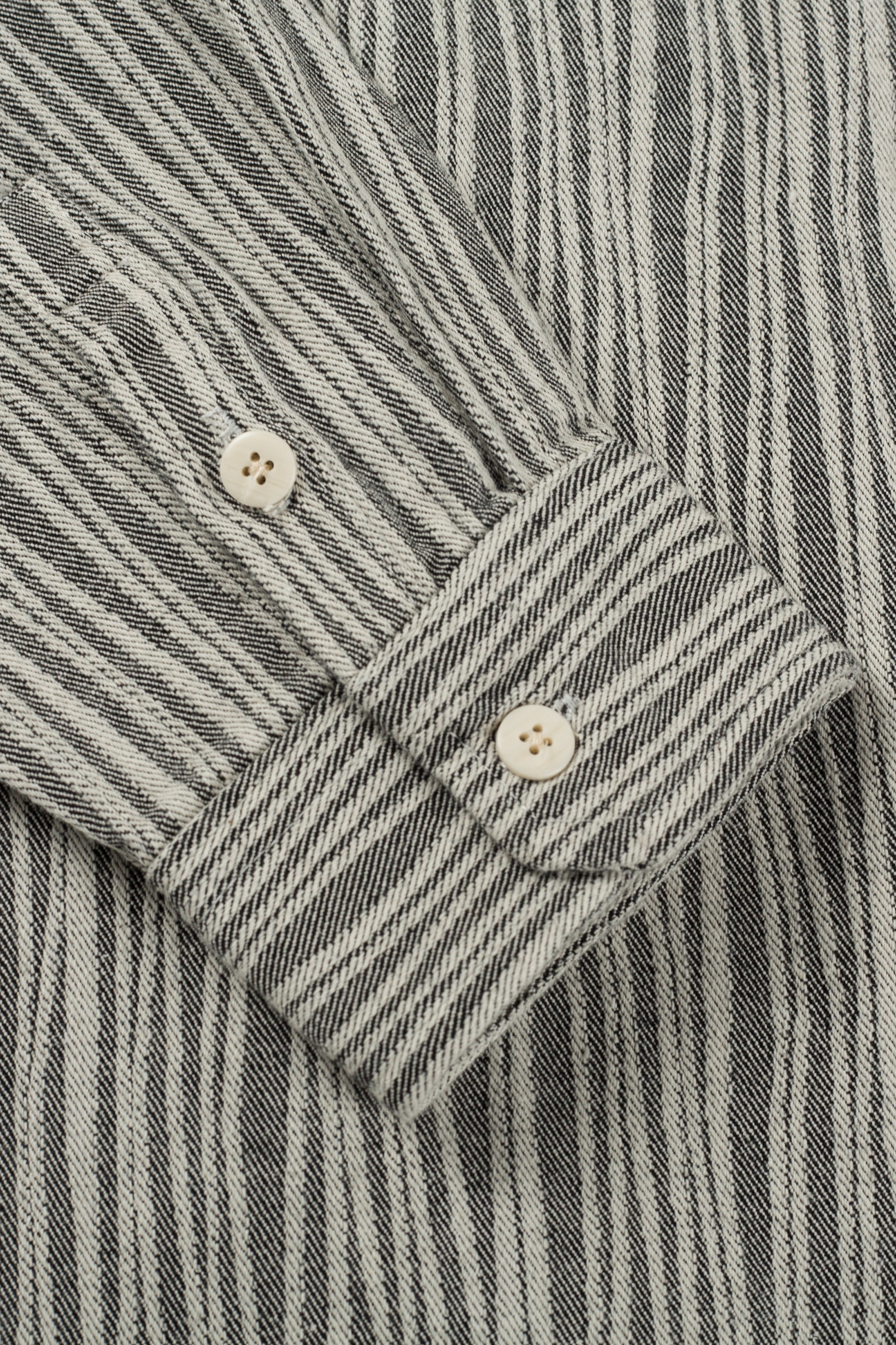 a close up of a black and white striped shirt
