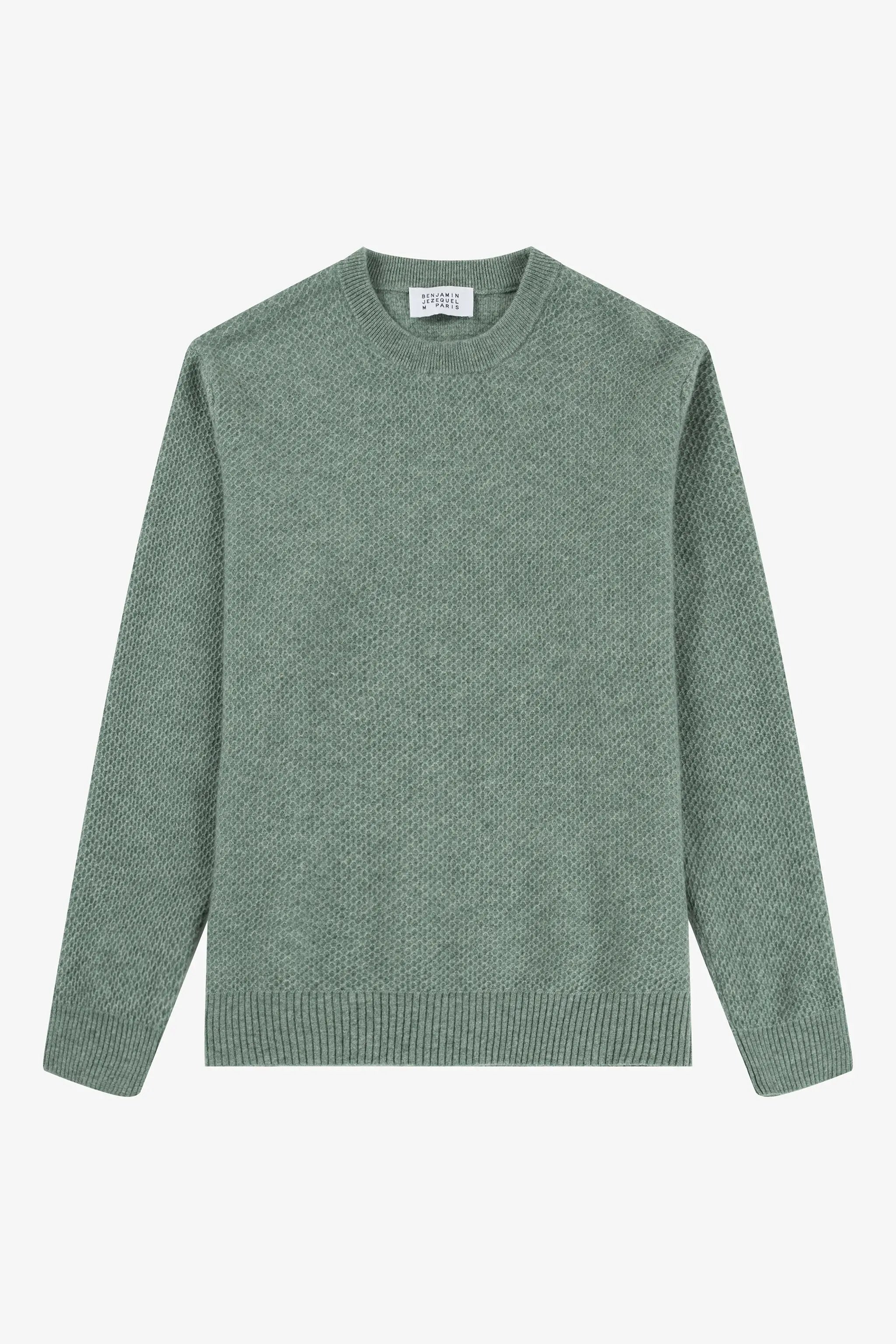 a green sweater with a round neck and long sleeves