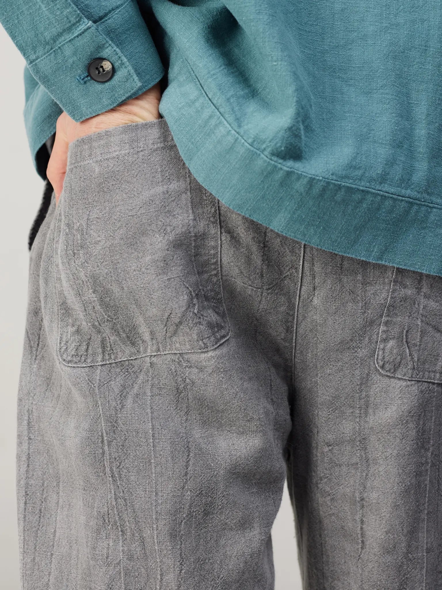 a pair of grey pants with a drawstring