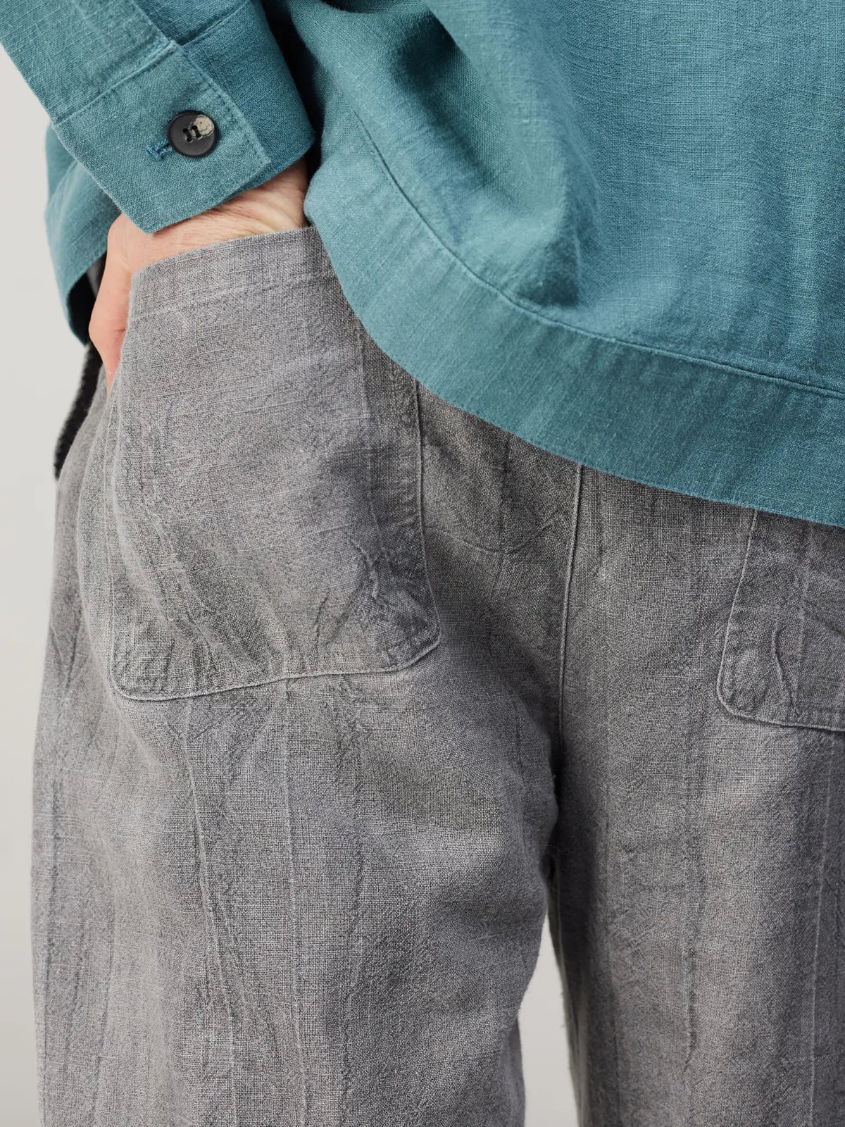 a pair of grey pants with a drawstring